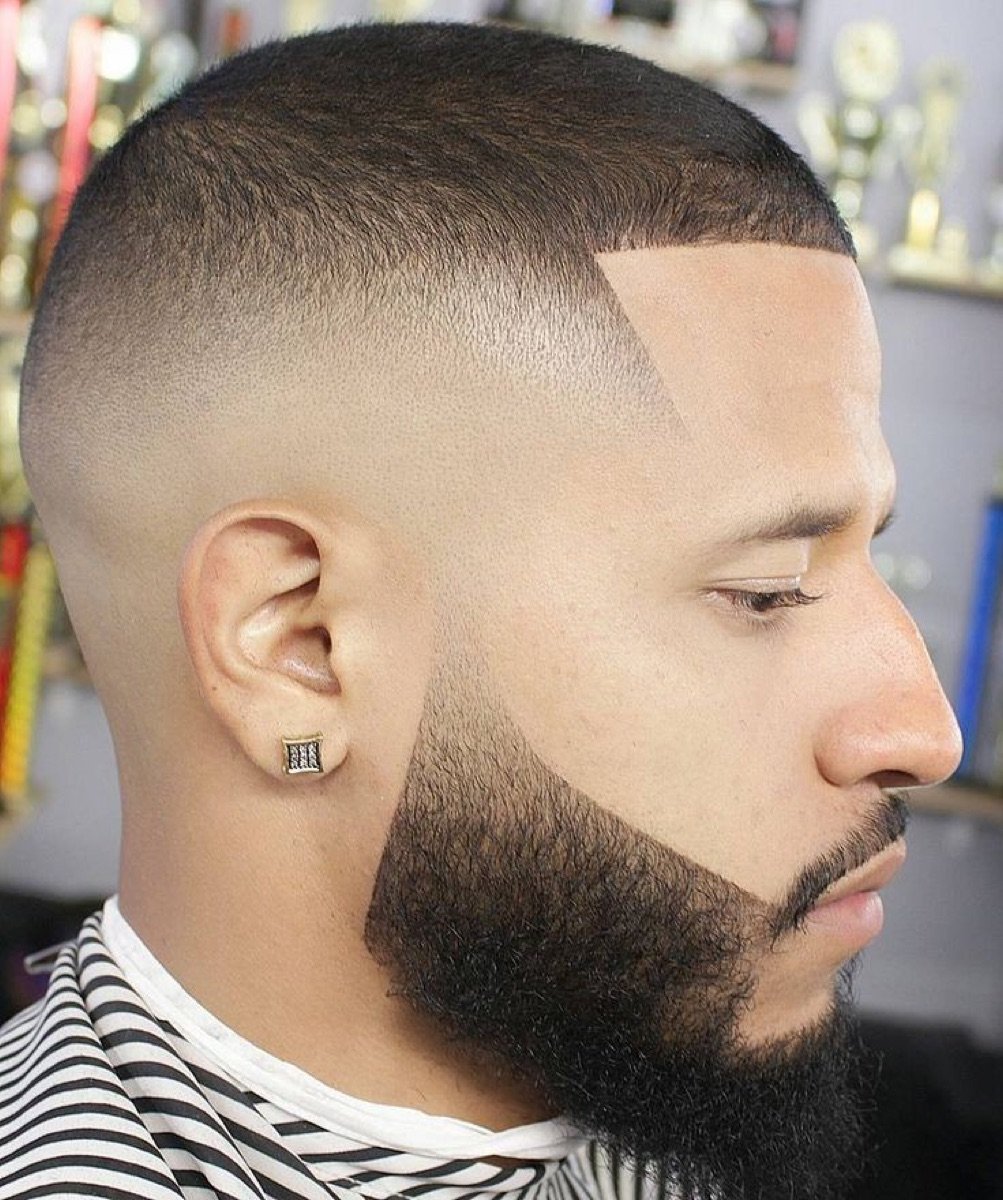 Skin fade with beard line-up
